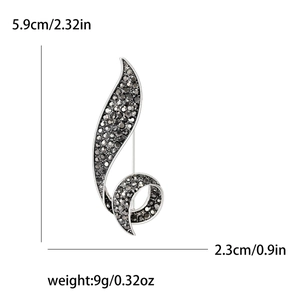Vintage gun-black rhinestone brooch for women with size 5.9x2.3cm and 9g weight info