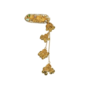 Ethnic gold hair clip with rhinestones, green gems and hanging bell tassels