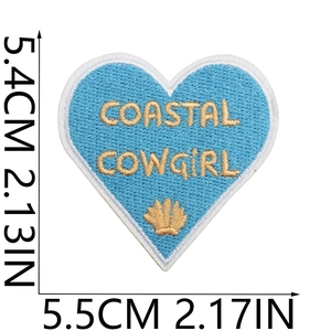 Detailed view of heart-shaped coastal cowgirl embroidery patch with size dimensions