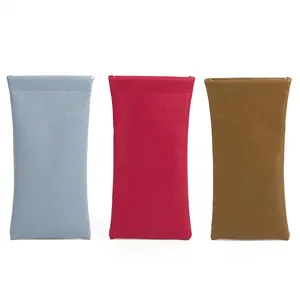 Portable PU leather squeeze glasses pouch set in light blue, rose red, and caramel colors