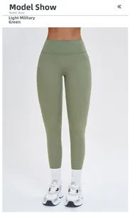 Detail of high-waist yoga pants in light army green with white socks and sneakers