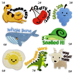 Detailed embroidery of 8 cartoon iron-on patches with puns on white background