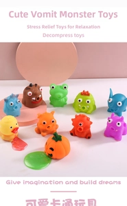 Close-up of colorful squeeze slime toys in cute duck, frog, and pumpkin shapes
