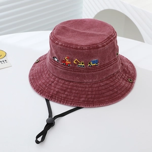 Detail of burgundy wash denim kids bucket hat with colorful cartoon vehicle embroidery