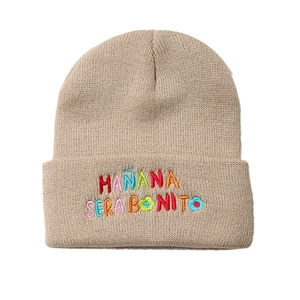 Khaki knit beanie featuring colorful Mañana Será Bonito floral embroidery for winter warmth
