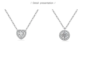 Detail presentation of heart and halo pendant necklaces with sparkling zircons