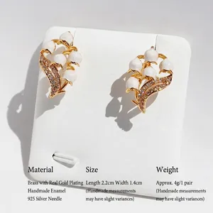 Handmade lily of the valley earrings with white enamel pearls and gold plated brass