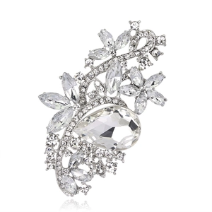 Detailed view of luxury silver flower brooch with pear-cut crystal and rhinestones