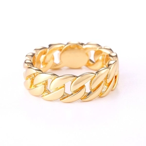 Close-up of polished gold-plated Cuban link chain ring with realistic metallic texture