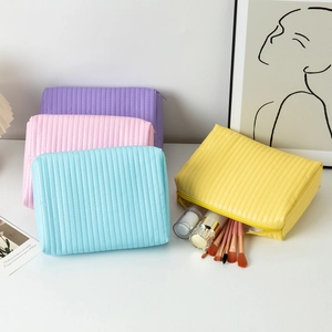 Set of 4 quilted PU leather makeup bags in vibrant colors for travel organization