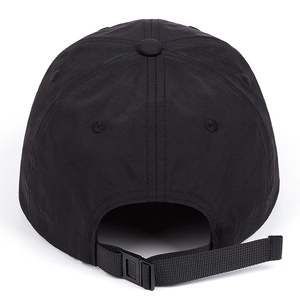 Detail view of the black ripstop fabric and adjustable buckle on the baseball cap