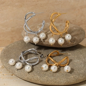 Eleganti orecchini a goccia con perle in acciaio 316 e design incrociato oro e argento