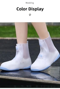 Detail of high-top silicone shoe covers with non-slip soles and blue snap fasteners