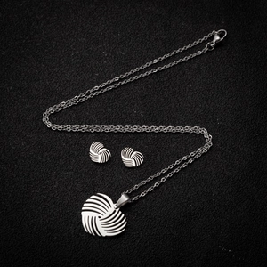 Three-piece silver stainless steel jewelry set with circular hollow swirl design necklaces