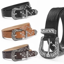 Detailed view of Western-style PU leather belts with metal star studs and ornate buckles