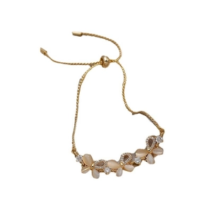 Elegant gold butterfly bolo bracelet with opal stones and sparkling zircon details