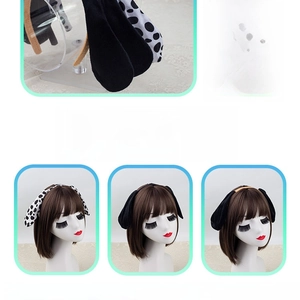 Detailed view of plush animal ear headbands in spotted, black, and brown styles