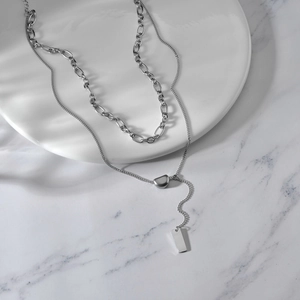 Double-layered silver titanium steel necklace with heart and geometric tassel pendants