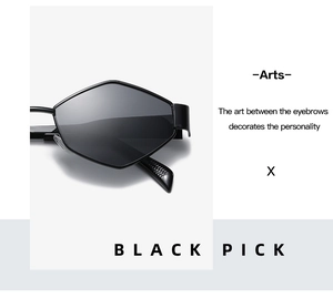 Detail of geometric black sunglasses showing the diamond-shaped frame and high-gloss finish
