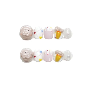 Handmade press-on nails featuring cute 3D pink pig relief and cartoon heart designs