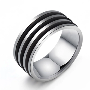Minimalist 10mm wide stainless steel ring with three black stripes in a 45-degree angle