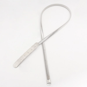 Detail of silver metallic stretch belt with interlocking flat links and hook closure