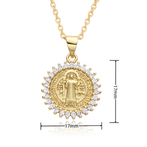 Detail showing a 17mm religious icon pendant necklace in gold plated copper with zircons