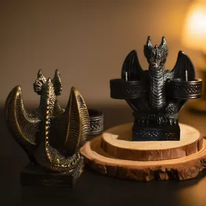 Detailed dragon candle holder mold showing intricate wing texture and vintage bronze finish