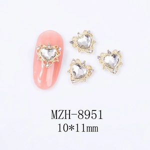Detailed macro view of 10x11mm hollow heart alloy nail art charms with crystals