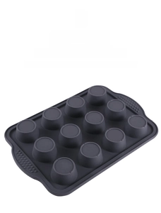 Detail of 12-cup silicone muffin pan with non-slip handles for baking cakes