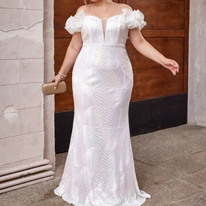 Detail of off-shoulder sequin evening dress with ruffle sleeves and mermaid silhouette