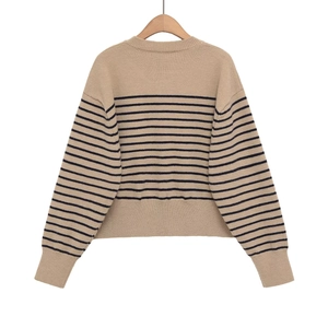 Classic beige striped long sleeve crewneck sweater with ribbed cuffs on wooden hanger