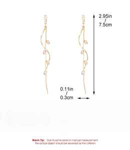 Detail view of 7.5cm gold tassel earrings with size dimensions and clear crystal accents