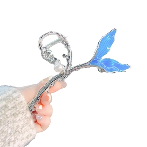 Large silver metal hair claw with blue mermaid tail design and pearl accent