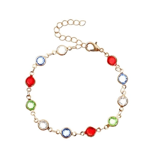 Detail of gold chain bracelet with colorful round gems and lobster clasp closure