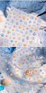 Detailed laser sea life nail stickers featuring colorful tropical fish and turtle patterns