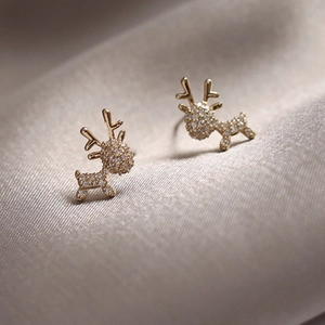 Elegant gold reindeer stud earrings featuring sparkling white zircon pave settings