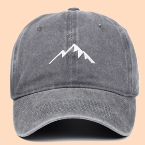 Washed dark gray cotton baseball cap featuring white mountain embroidery and curved brim