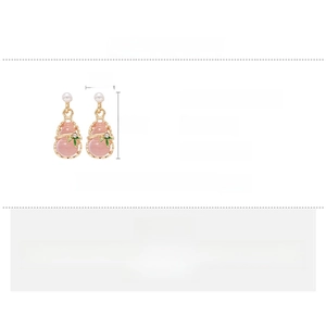 Detail view of pink resin gourd earrings with gold frame, silver needles and dimensions