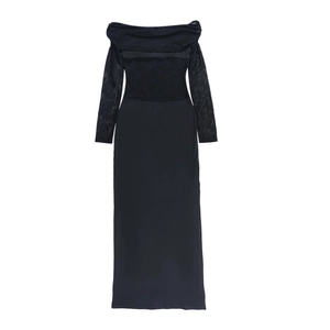 Detail of elegant black off-shoulder mesh stitching and fine lace texture on long sleeve dress