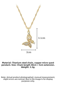 Detailed view of butterfly pendant with micro-paved zircons and 40cm titanium steel chain