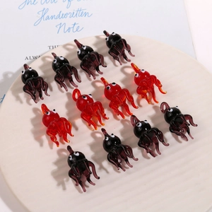 Set of 12 handmade glass octopus charms in red and purple for DIY jewelry making