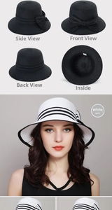 Detail of wide brim straw sun hat with decorative bow and black stripe accent