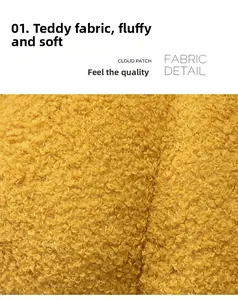 Close-up of soft yellow teddy fleece fabric texture on a pumpkin plush pillow