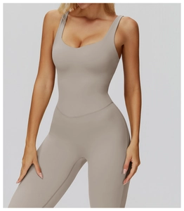 Detail of high-stretch taupe yoga bodysuit featuring a round neck and slim-fit waist design