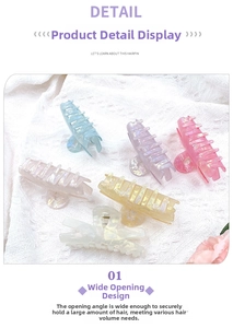 Close-up of 9cm pearlescent hair claws in six colors on white fabric background