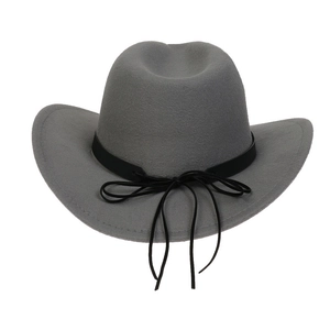 Detail shot of grey felt cowboy hat featuring suede texture and black bow ribbon decoration