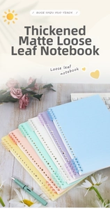 Detailed view of colorful frosted A5 B5 loose-leaf notebook covers with pens and flowers