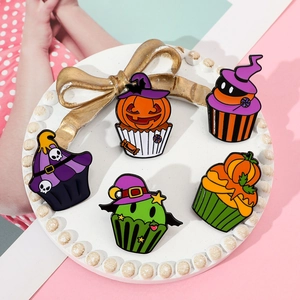 Set of 5 creative Halloween cupcake enamel pins featuring pumpkin and skull motifs