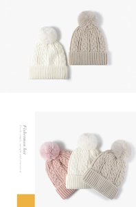 Detailed knit texture and pom-pom accents on winter beanies in multiple colors